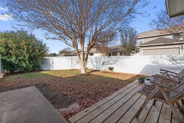 a picture of a bench in front of a window