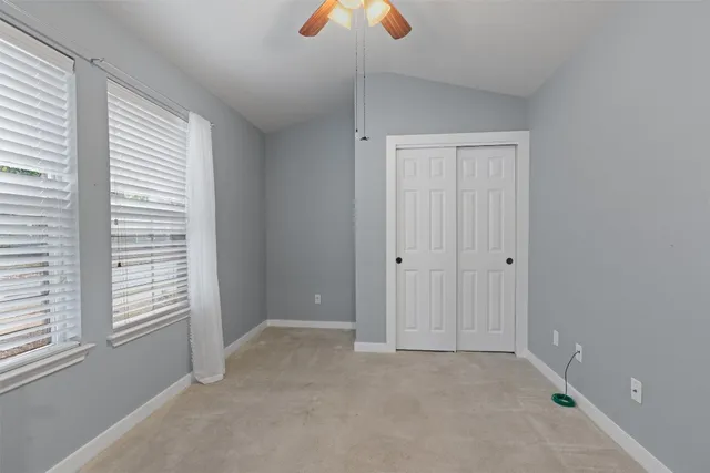 a view of a kitchen counter space and wooden floor