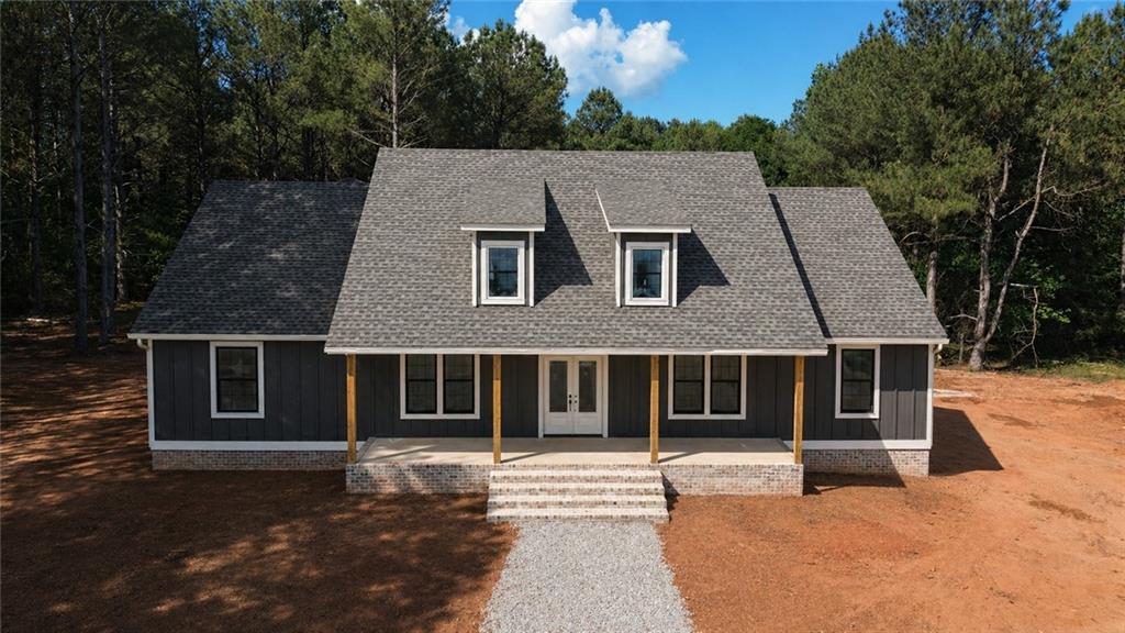 760 Frank Crook Road Canon, GA 30520 - Photo 2 of 9 a front view of a house with a yard