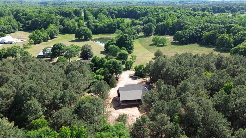 760 Frank Crook Road Canon, GA 30520 - Photo 3 of 9 an aerial view of residential house with outdoor space and trees all around