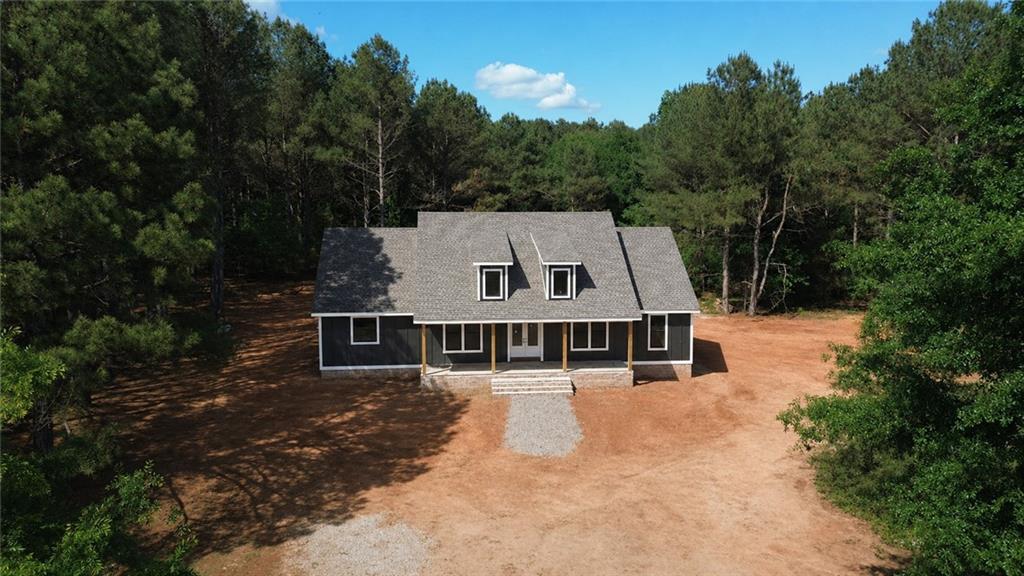 760 Frank Crook Road Canon, GA 30520 - Photo 5 of 9 a view of a house with a yard