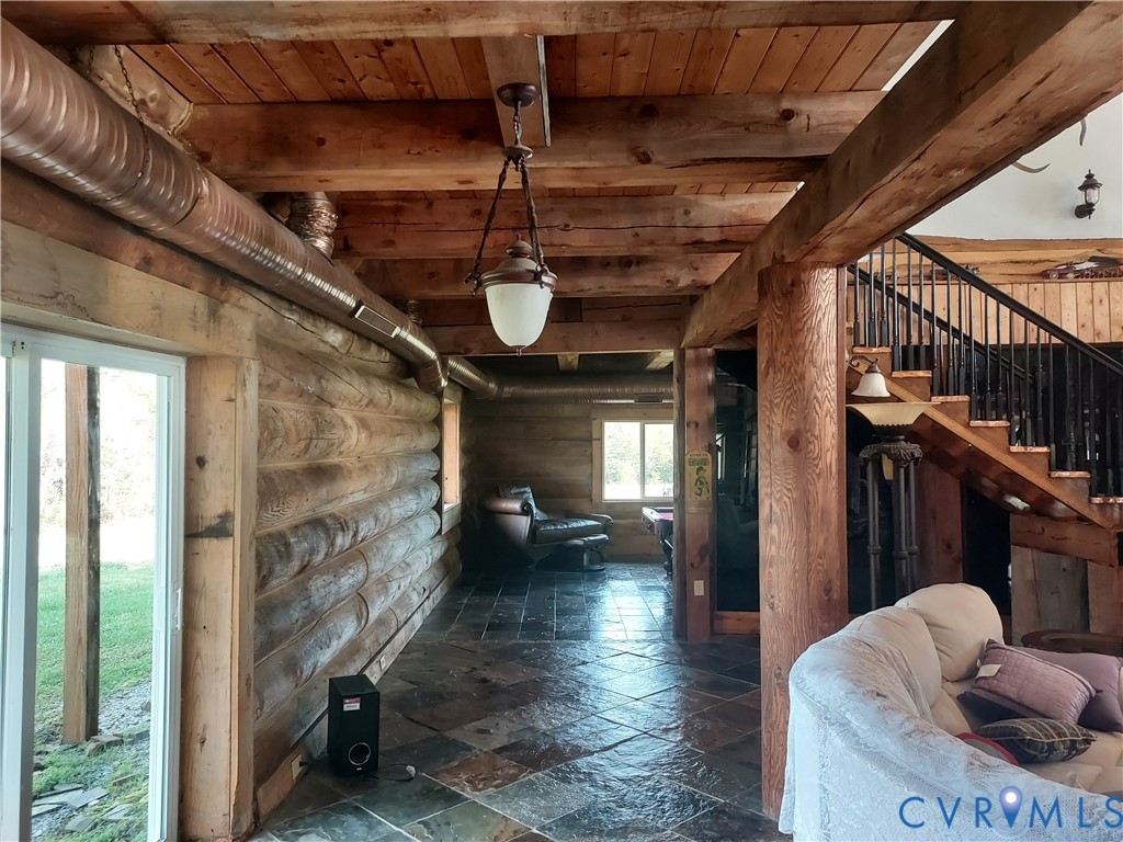 6430 River Road West Columbia, VA 23038 - Photo 13 of 48 a view of entryway and hall with wooden floor