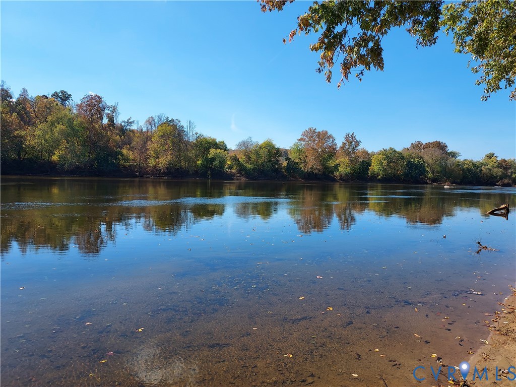 6430 River Road West Columbia, VA 23038 - Photo 3 of 48 a view of a lake with houses in the back