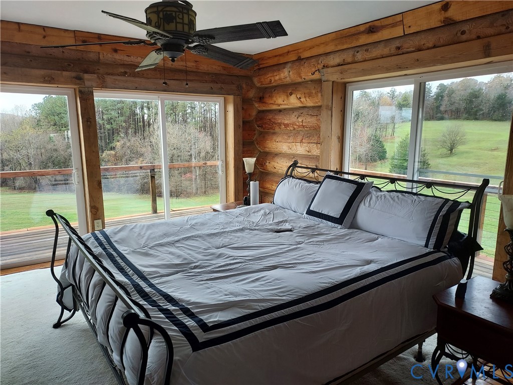 6430 River Road West Columbia, VA 23038 - Photo 36 of 48 a view of a dining room with furniture window and outside view