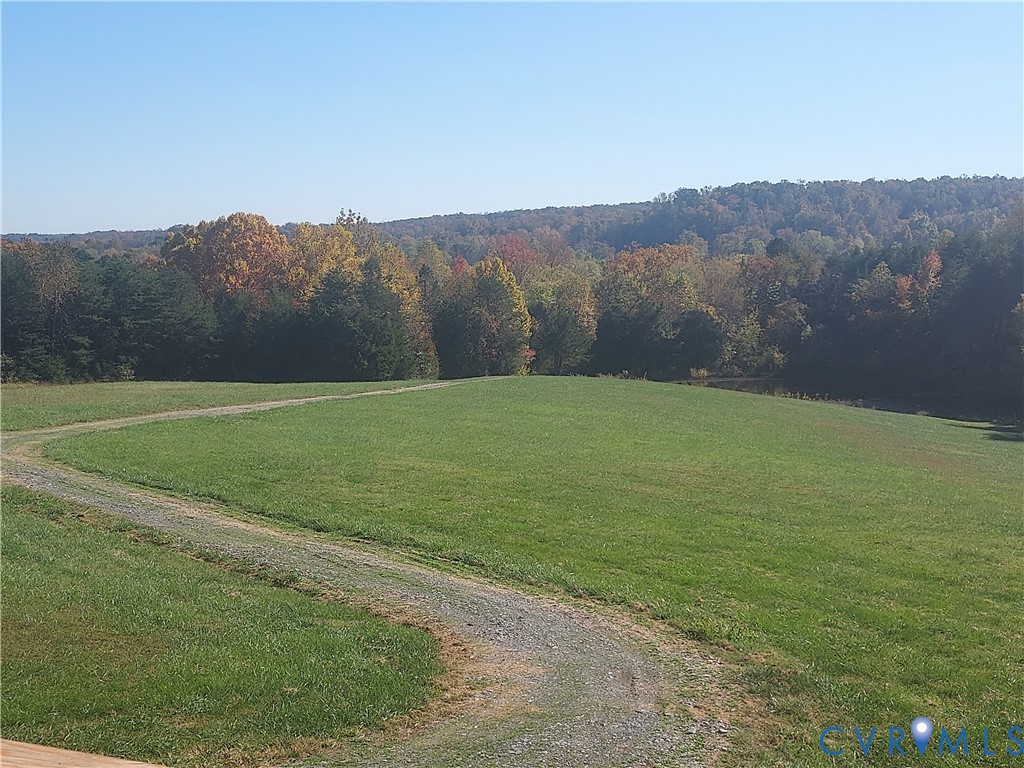6430 River Road West Columbia, VA 23038 - Photo 8 of 48 a view of a field with mountains in the background