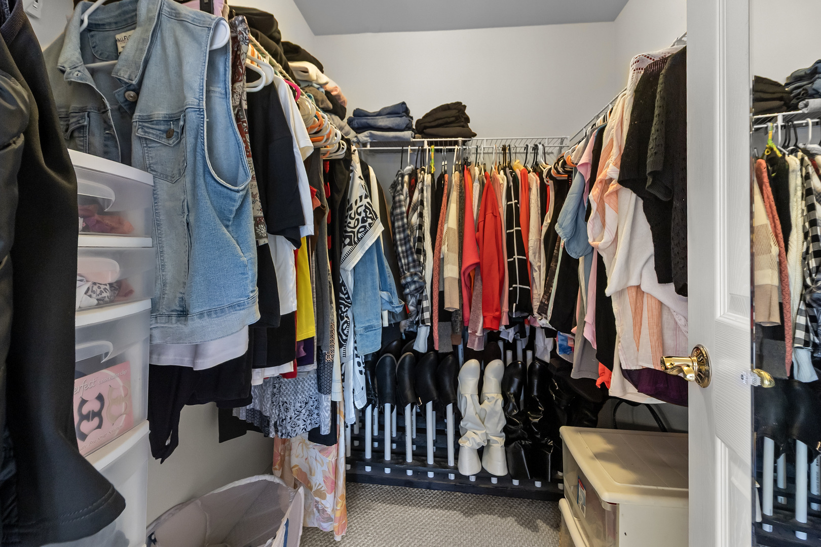 362 Keswick Circle Round Lake, IL 60073 - Photo 15 of 27 a view of walk in closet with clothes and shoes