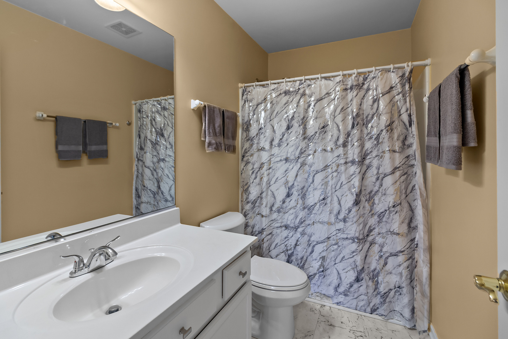 362 Keswick Circle Round Lake, IL 60073 - Photo 16 of 27 a bathroom with a sink and a mirror