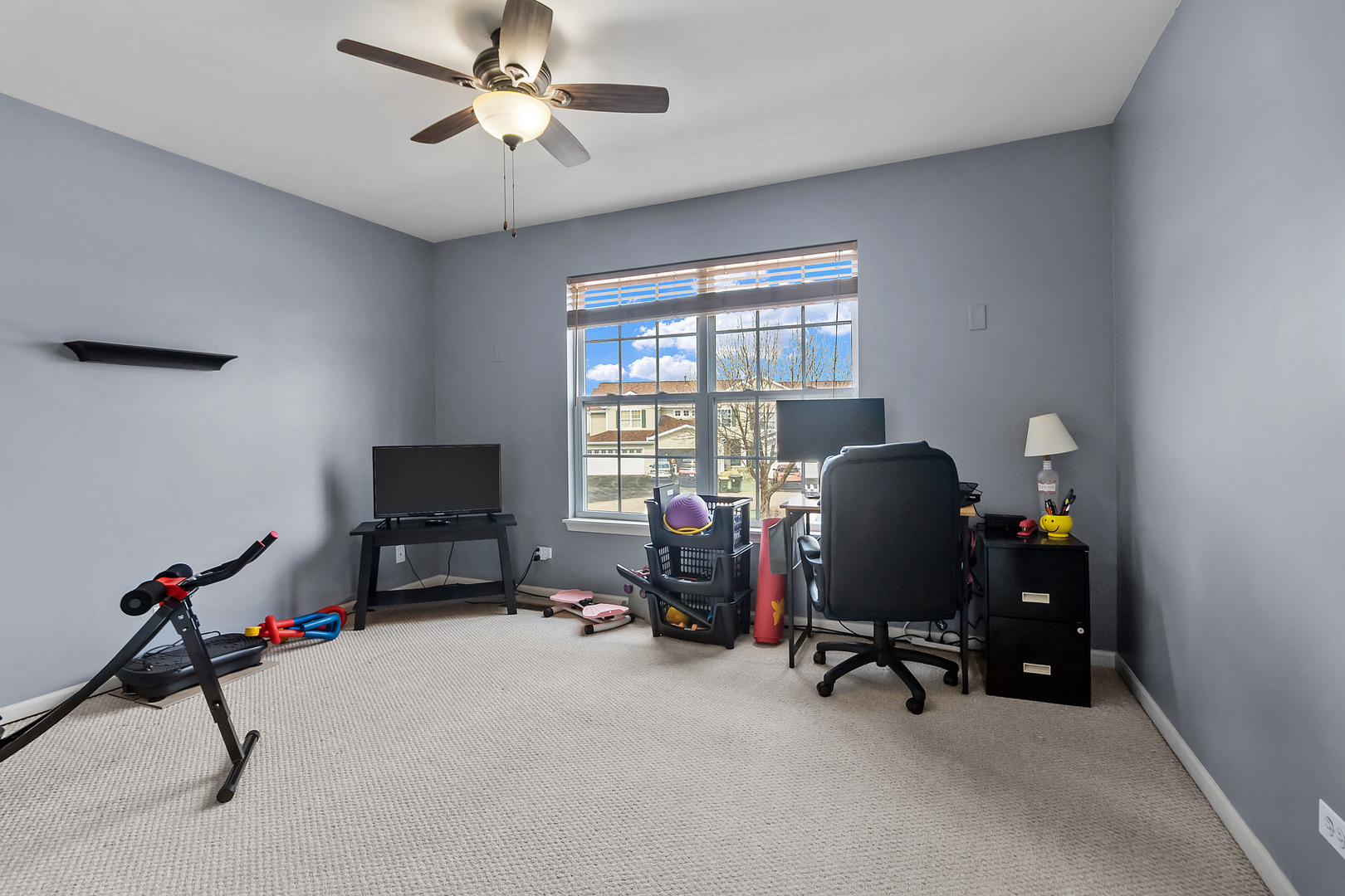 362 Keswick Circle Round Lake, IL 60073 - Photo 17 of 27 a view of a workspace with furniture and a window