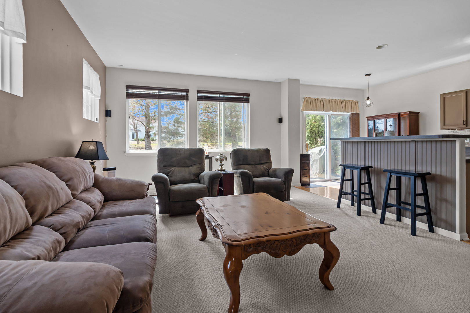 362 Keswick Circle Round Lake, IL 60073 - Photo 7 of 27 a living room with furniture and a large window