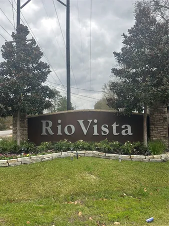 a street sign that is sitting in the grass