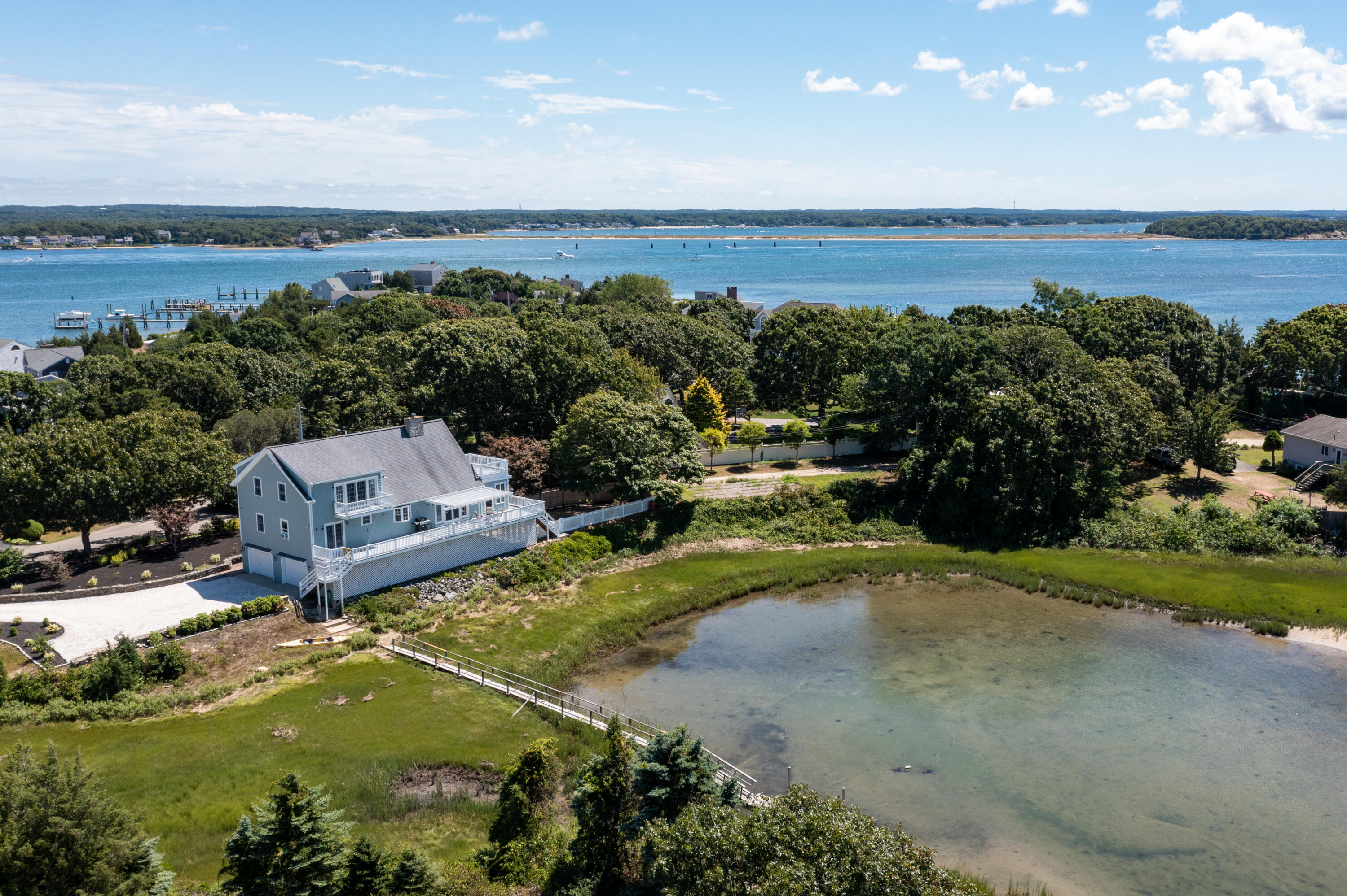 51 Robinwood Road Buzzards Bay, MA 02532 - Photo 23 of 27 an aerial view of a house with a garden
