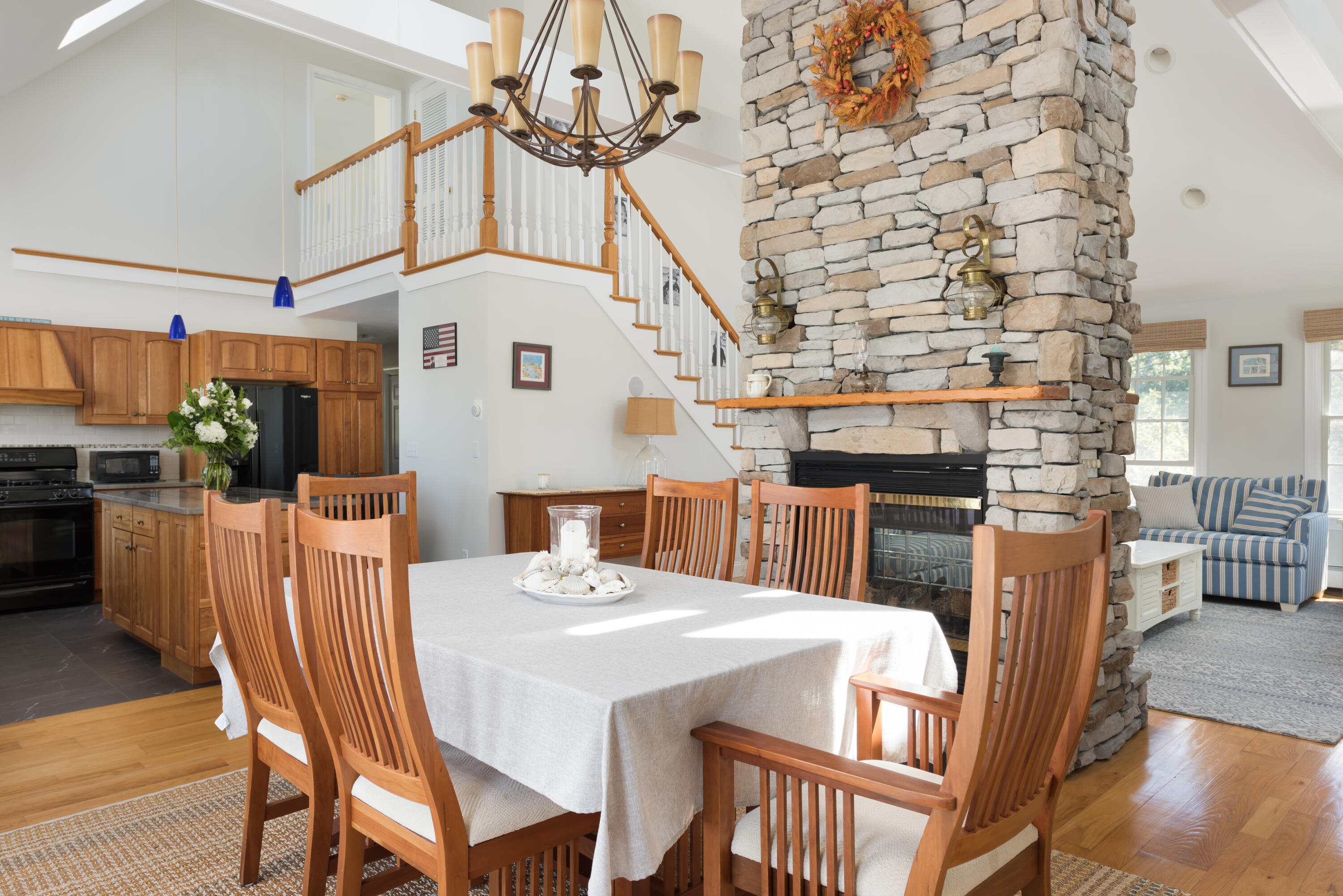 51 Robinwood Road Buzzards Bay, MA 02532 - Photo 10 of 27 a view of a dining room with furniture wooden floor and chandelier