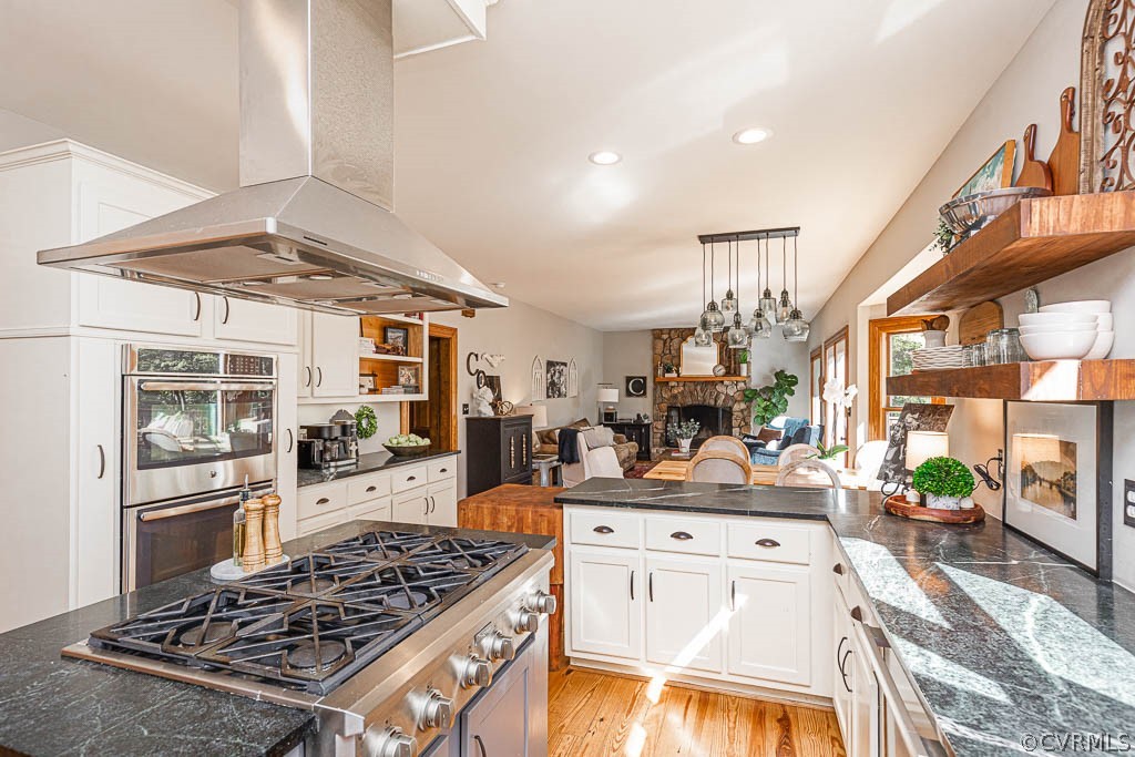 2090 Strawberry Run Crozier, VA 23039 - Photo 12 of 47 a kitchen with stainless steel appliances granite countertop a stove and a refrigerator