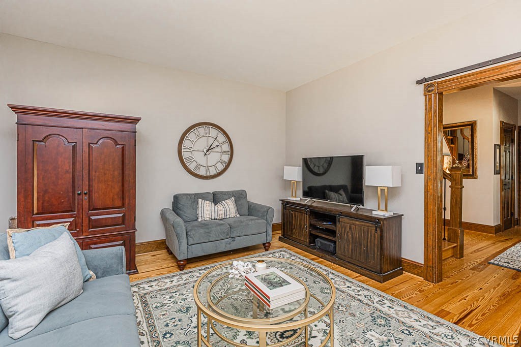 2090 Strawberry Run Crozier, VA 23039 - Photo 21 of 47 a living room with furniture and a flat screen tv