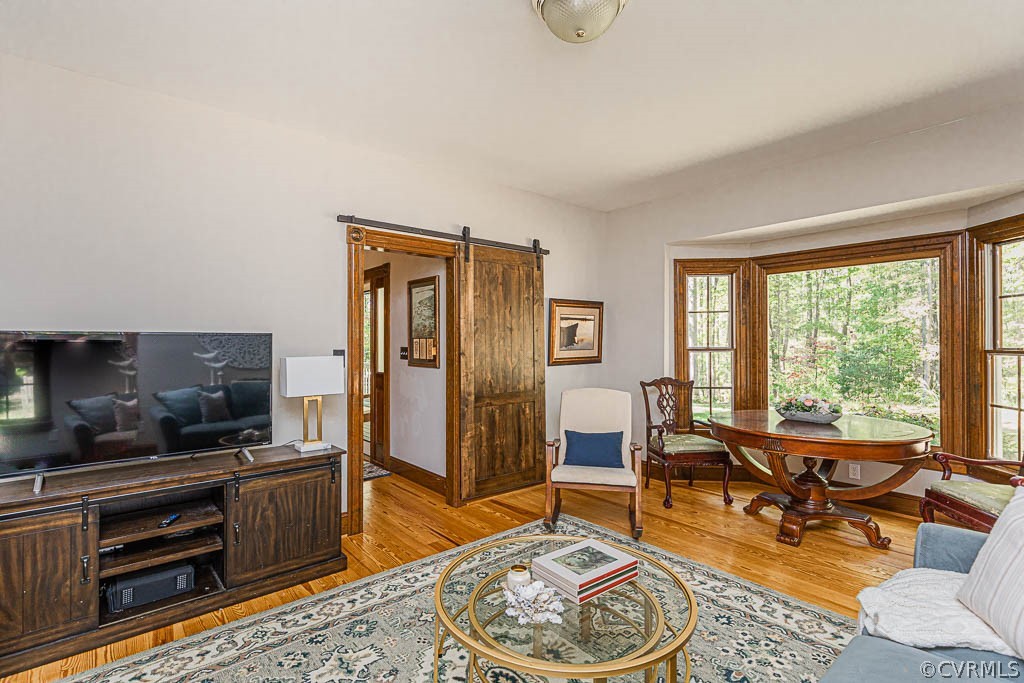 2090 Strawberry Run Crozier, VA 23039 - Photo 22 of 47 a living room with furniture and a flat screen tv