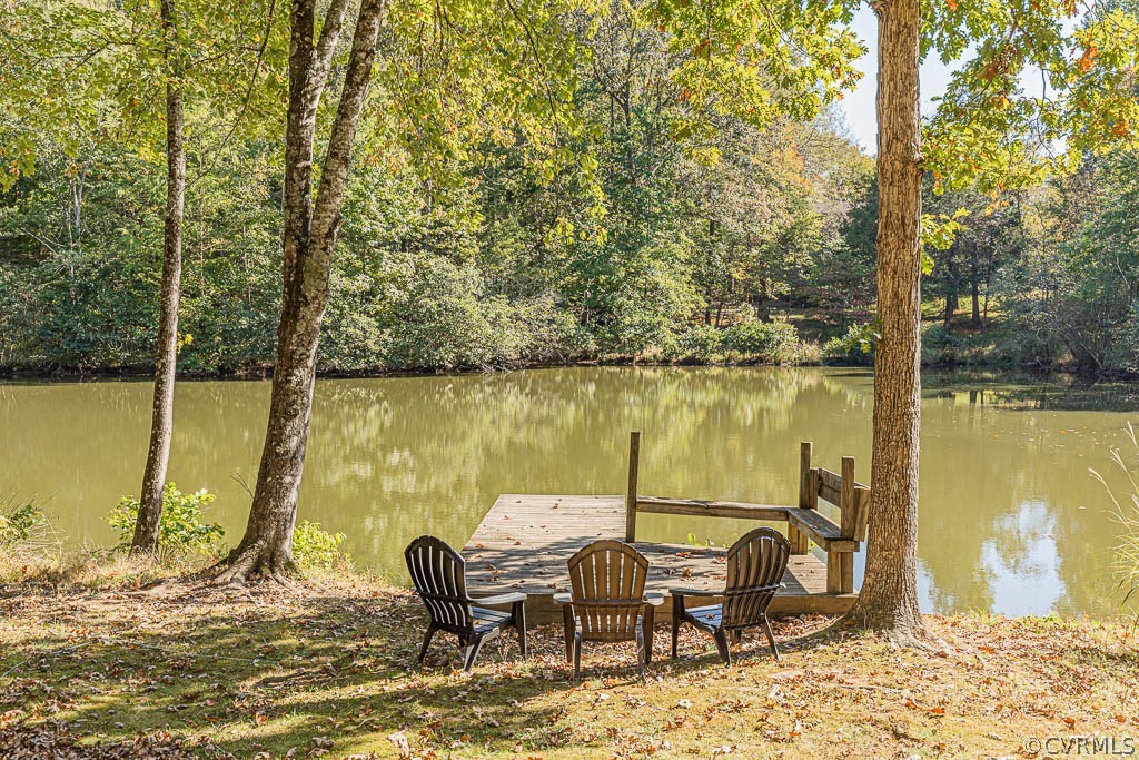 2090 Strawberry Run Crozier, VA 23039 - Photo 6 of 47 a view of a lake from a bench