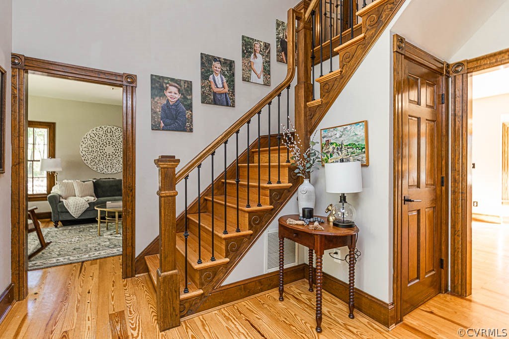 2090 Strawberry Run Crozier, VA 23039 - Photo 7 of 47 a view of a livingroom with furniture and stairs