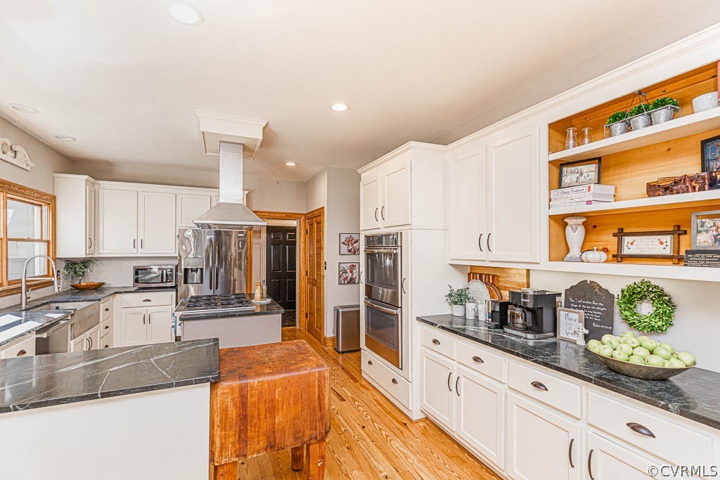 2090 Strawberry Run Crozier, VA 23039 - Photo 8 of 47 a kitchen with stainless steel appliances granite countertop a sink and a refrigerator