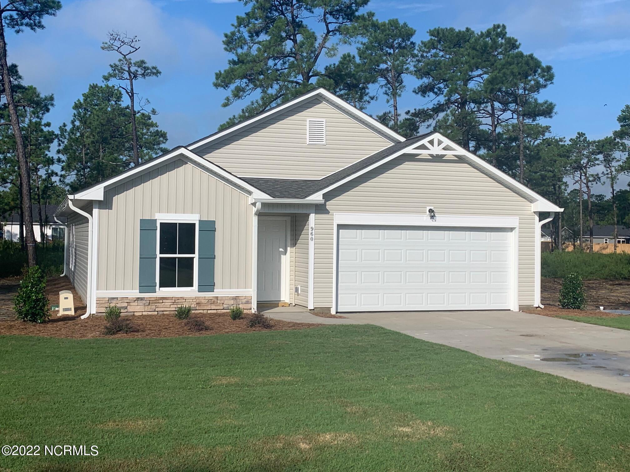 960 Pine Needles Road Southport, NC 28461 - Photo 1 of 4 960 Pine Needles Rd