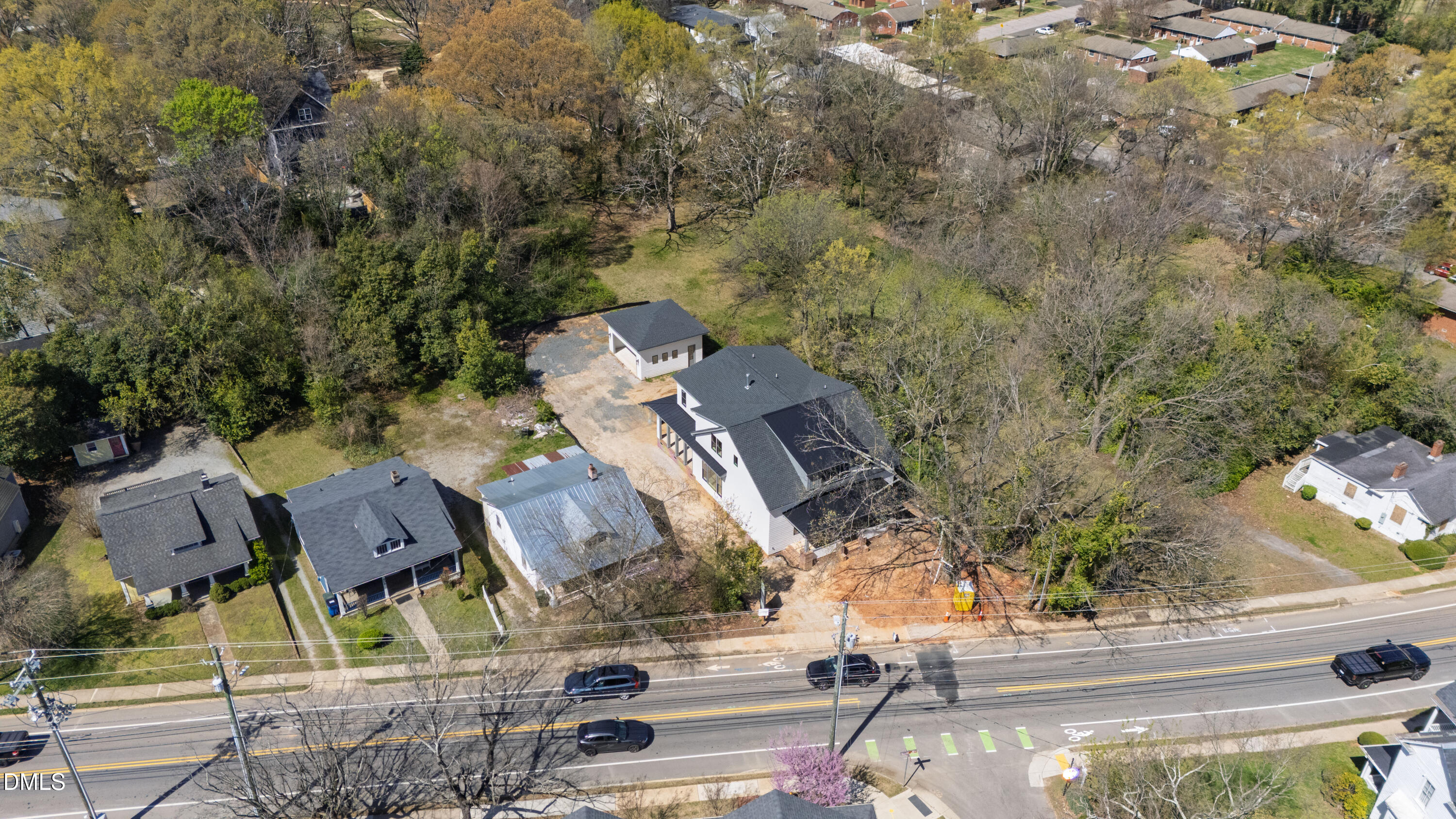 909 Oberlin Road Raleigh, NC 27605 - Photo 57 of 59 an aerial view of houses with yard