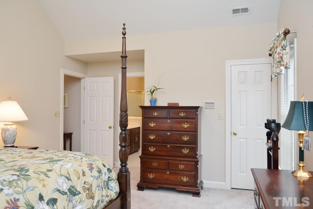 7924 Rooksley Court Raleigh, NC 27615 - Photo 18 of 25 Master Bedroom