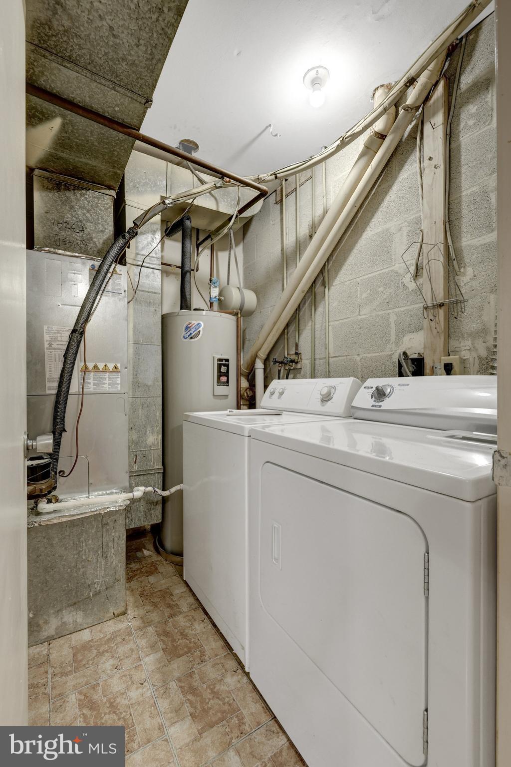 2142 Cartwright Place Reston, VA 20191 - Photo 18 of 46 a utility room with dryer and washer