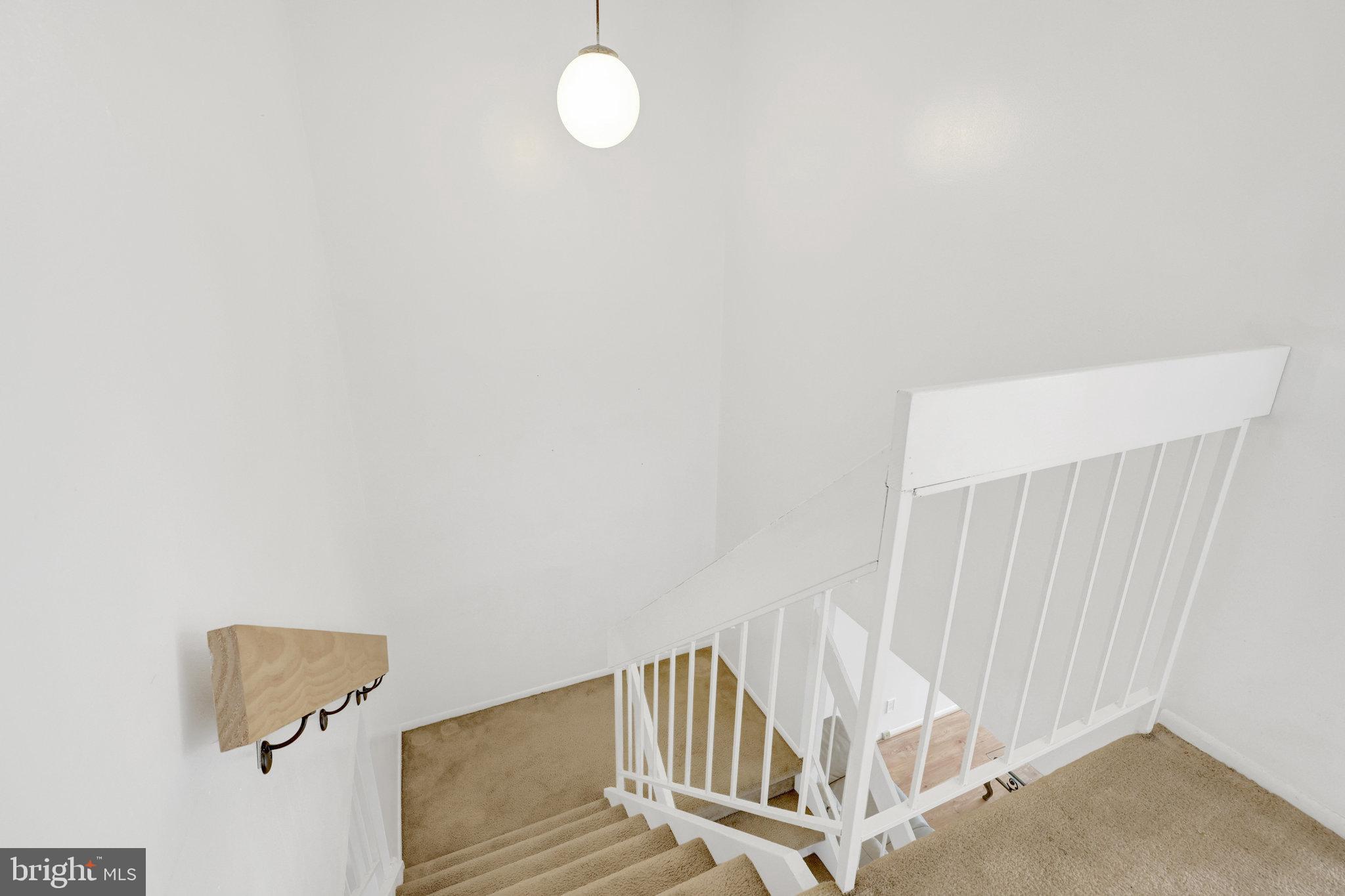 2142 Cartwright Place Reston, VA 20191 - Photo 19 of 46 a view of a room with staircase