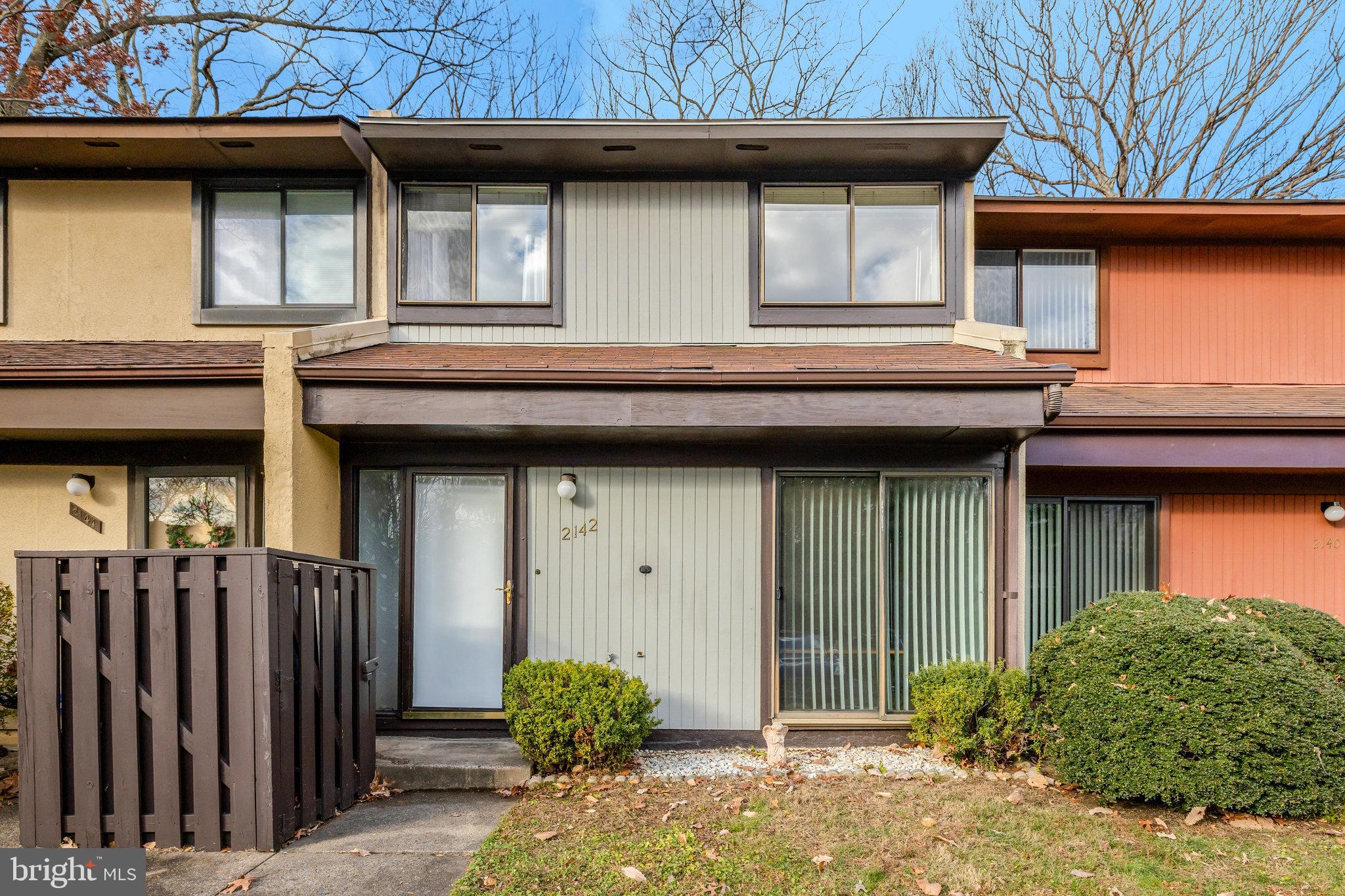 2142 Cartwright Place Reston, VA 20191 - Photo 2 of 46 a view of a house with door and wooden fence