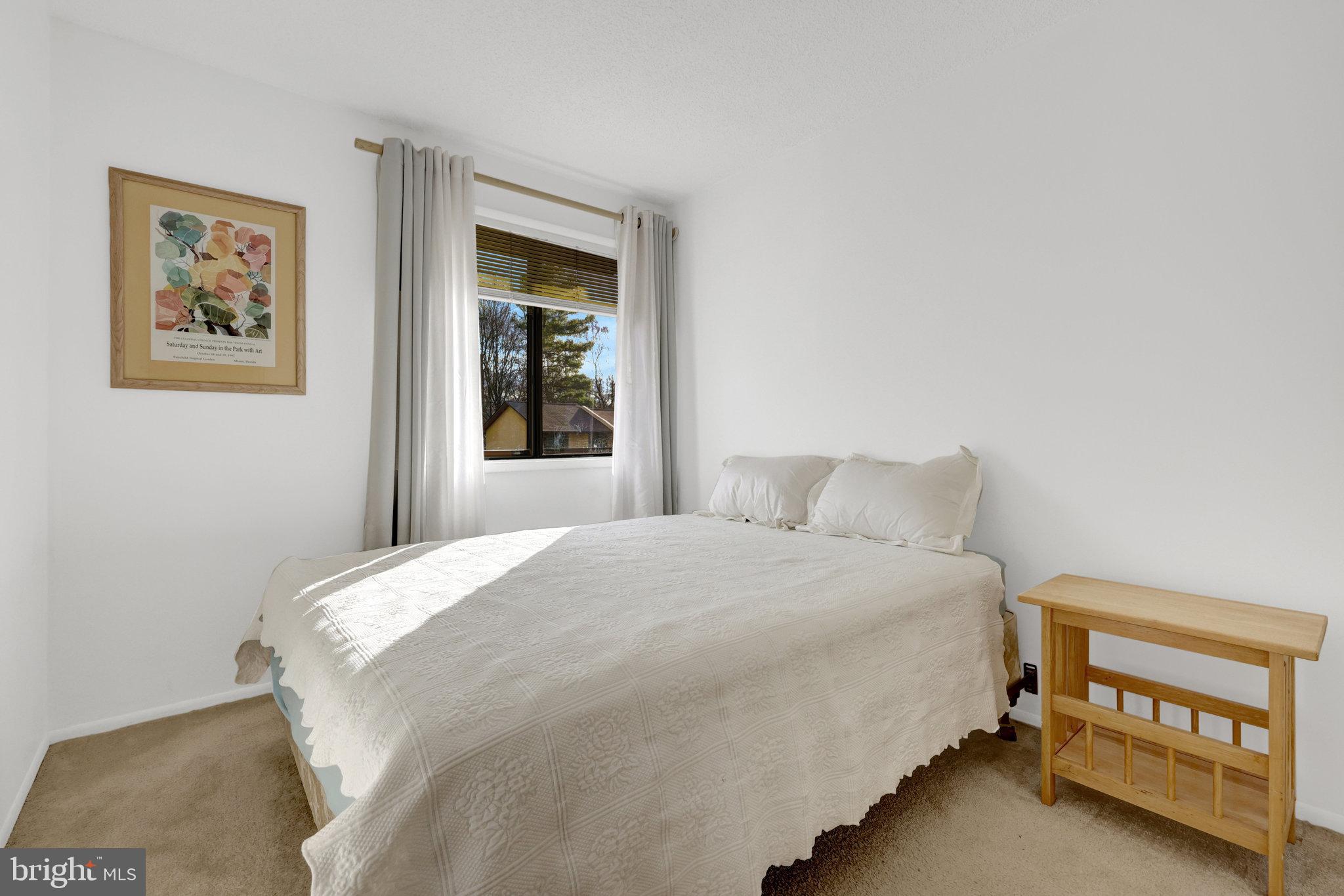 2142 Cartwright Place Reston, VA 20191 - Photo 25 of 46 a bedroom with a bed and a window