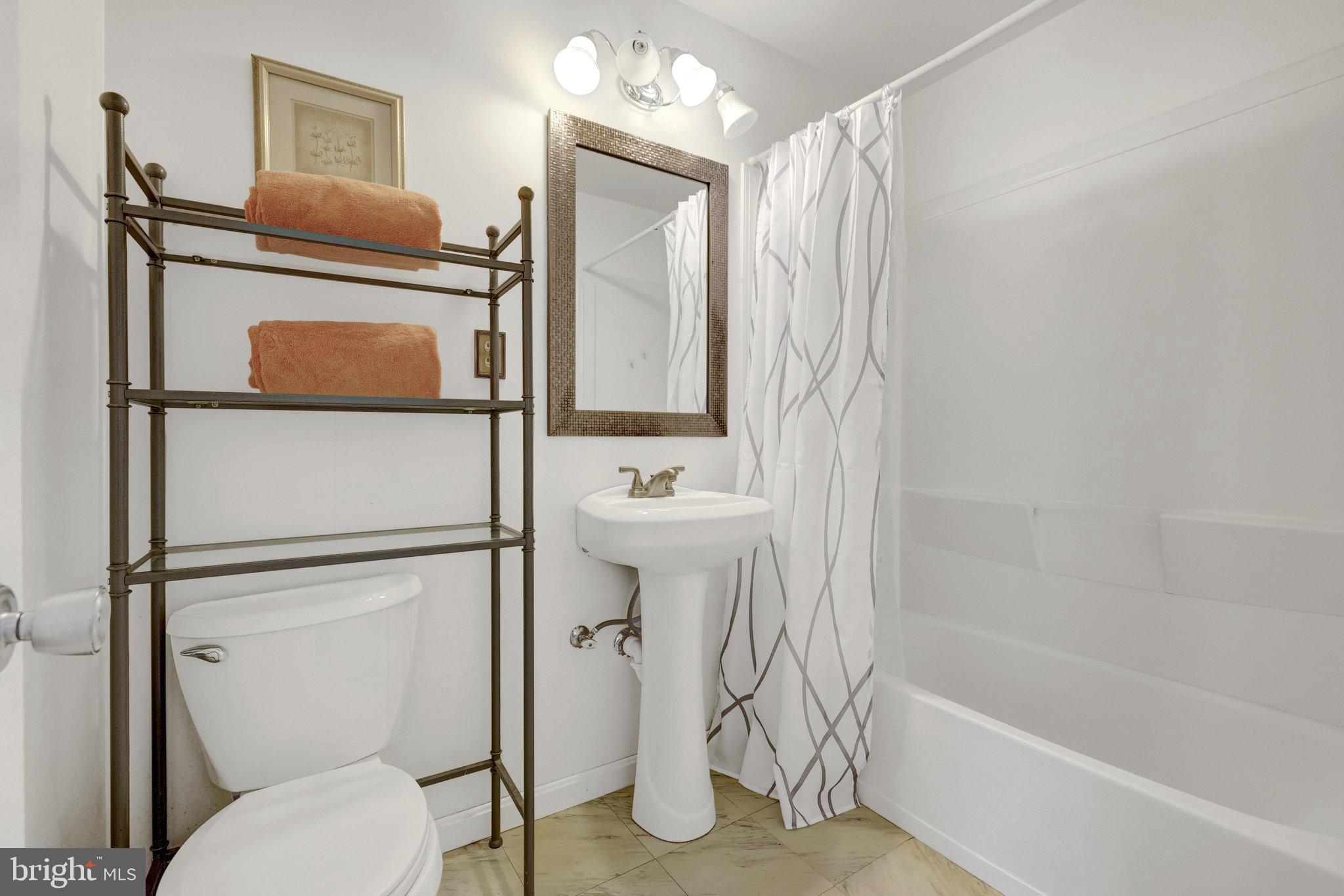 2142 Cartwright Place Reston, VA 20191 - Photo 26 of 46 a bathroom with a sink toilet and shower