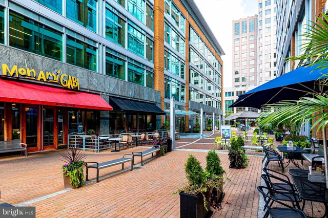 a view of a building with sitting area