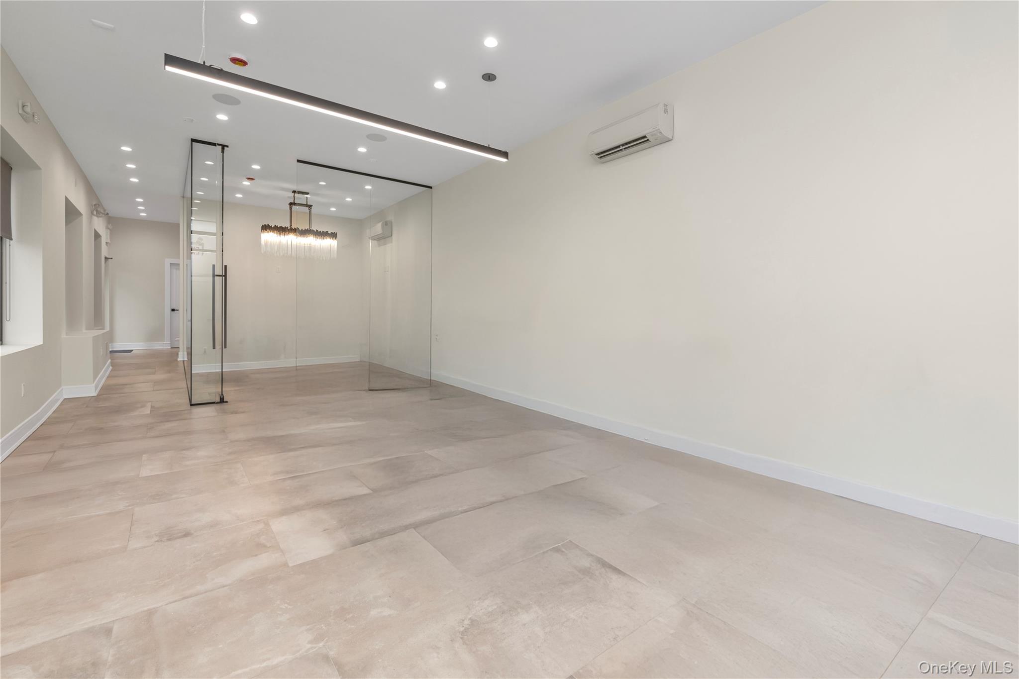 15-27 149th Street Queens, NY 11357 - Photo 6 of 15 an empty room with a bathroom