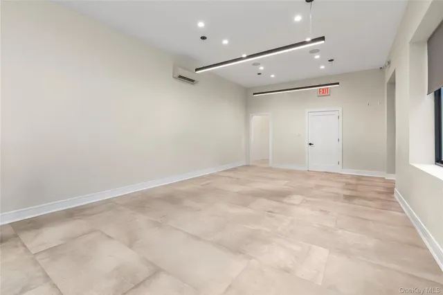 a view of a a dining room with furniture