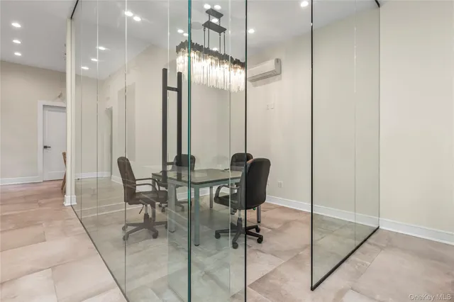 a kitchen with kitchen island a sink stove and refrigerator