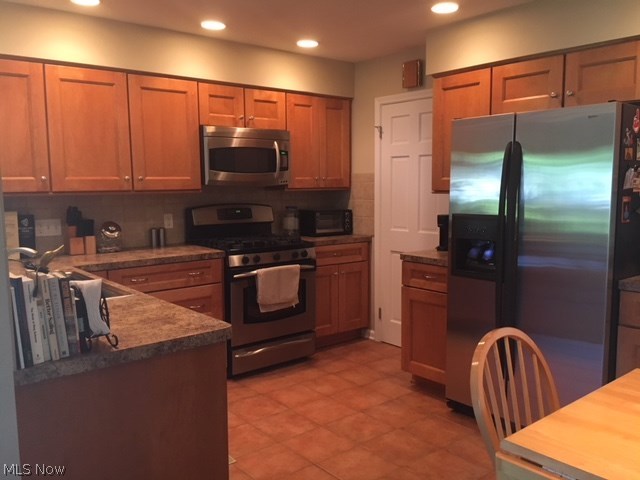 1649 Overbrook Road Cleveland, OH 44124 - Photo 8 of 22 Stainless appliances and plenty of cabinets to make this a kitchen you'll love to cook in!