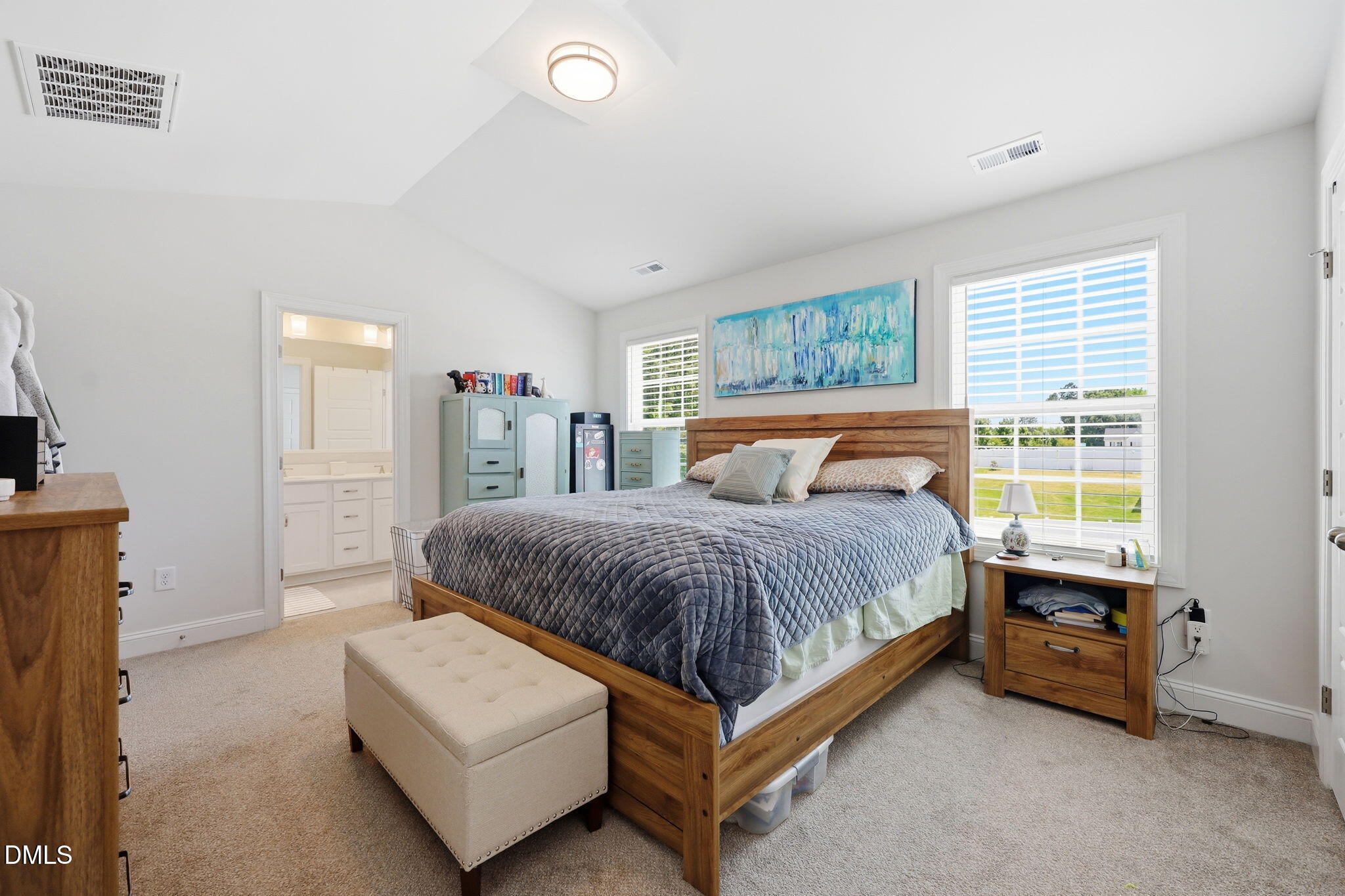 104 Kavanaugh Road Wake Forest, NC 27587 - Photo 18 of 36 a spacious bedroom with a bed and a window