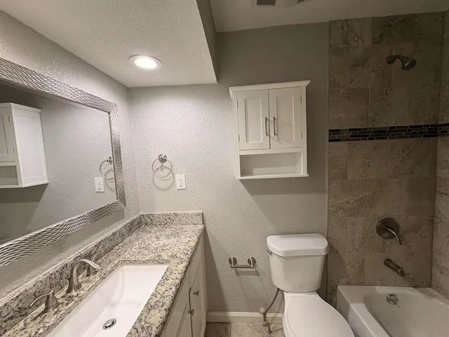 an empty room that has a window in it