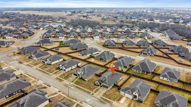 an aerial view of a city with lots of residential buildings