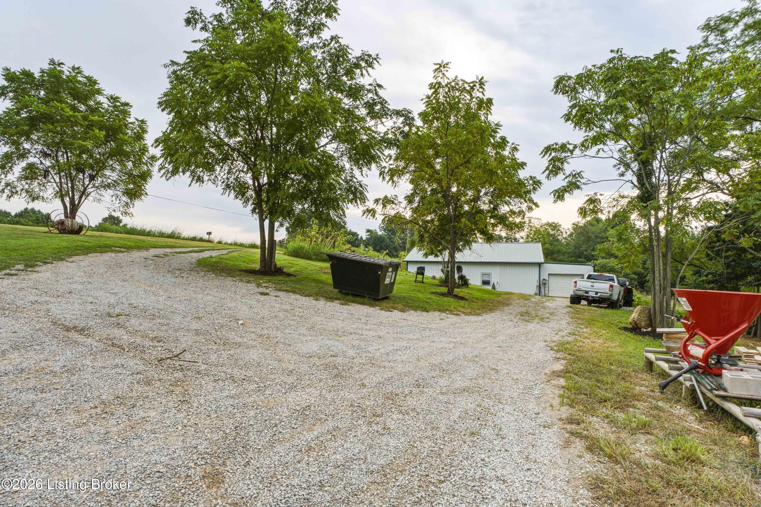 295 Bray Ridge Road Bedford, KY 40006 - Photo 69 of 72 02_Exterior_Front_Elevation_Dusk