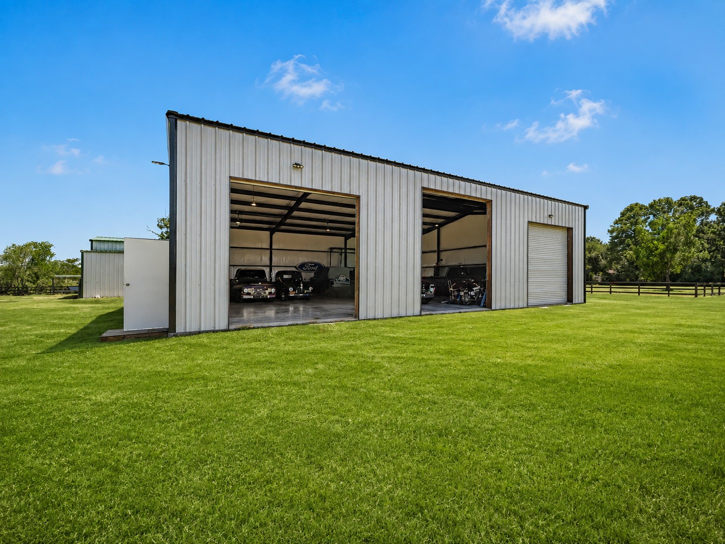 19023 Frey Road Hempstead, TX 77445 - Photo 38 of 49 Impressive 50 x 60 shop with 16-foot ceilings provides exceptional space for projects, storage, equipment, or additional work space.