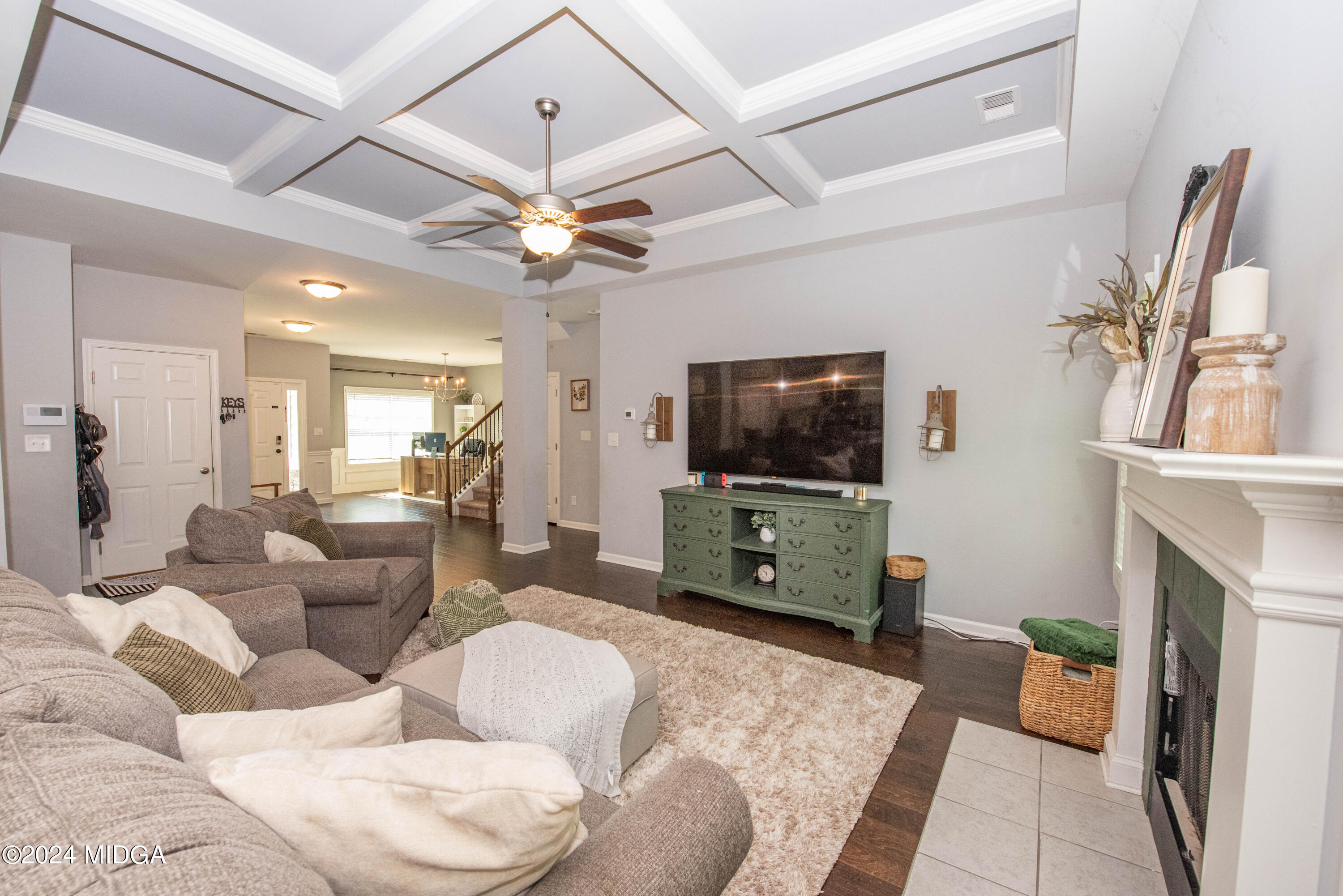 103 Wax Myrtle Way Perry, GA 31069 - Photo 12 of 62 a living room with furniture and a flat screen tv