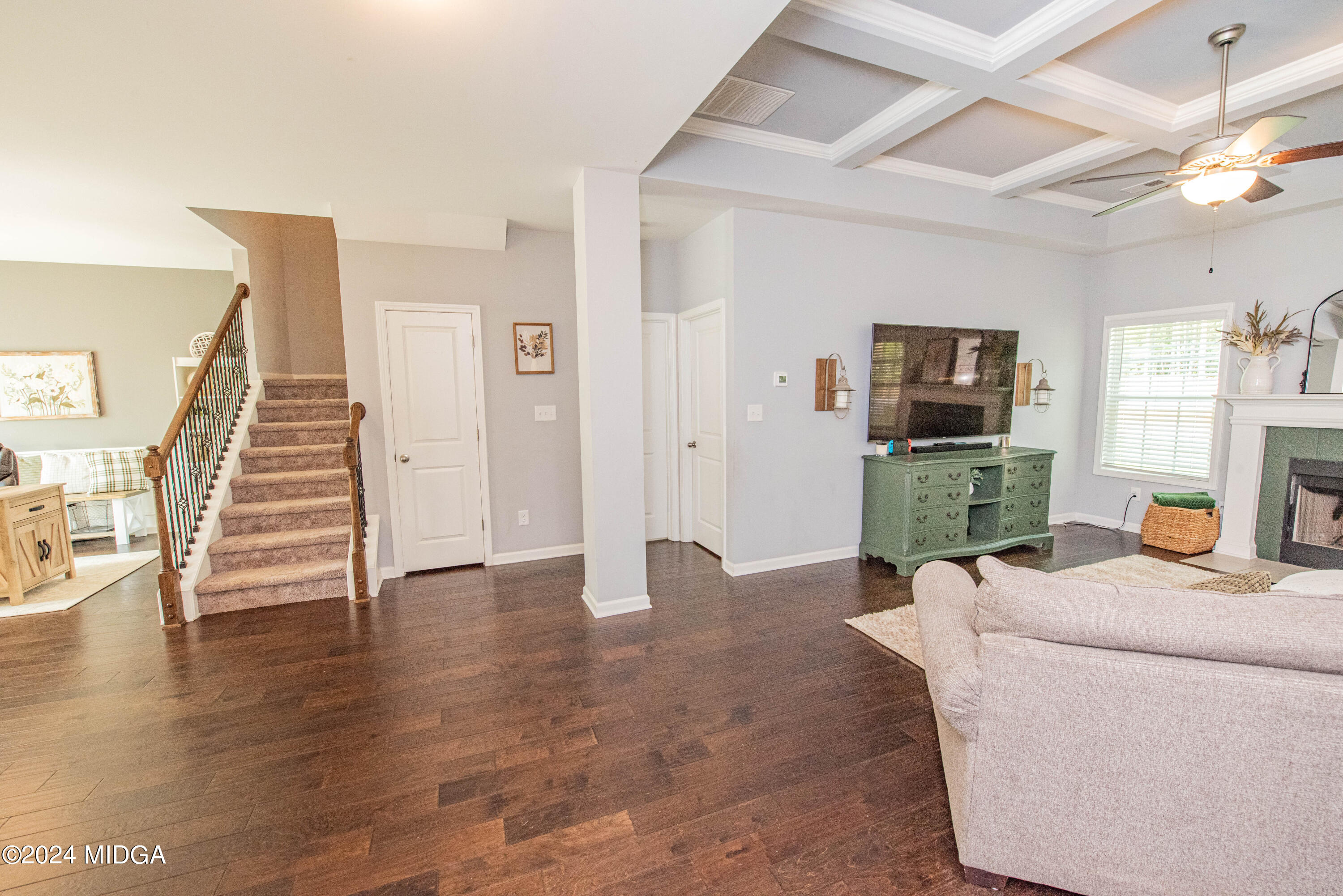 103 Wax Myrtle Way Perry, GA 31069 - Photo 19 of 62 a living room with furniture and a flat screen tv