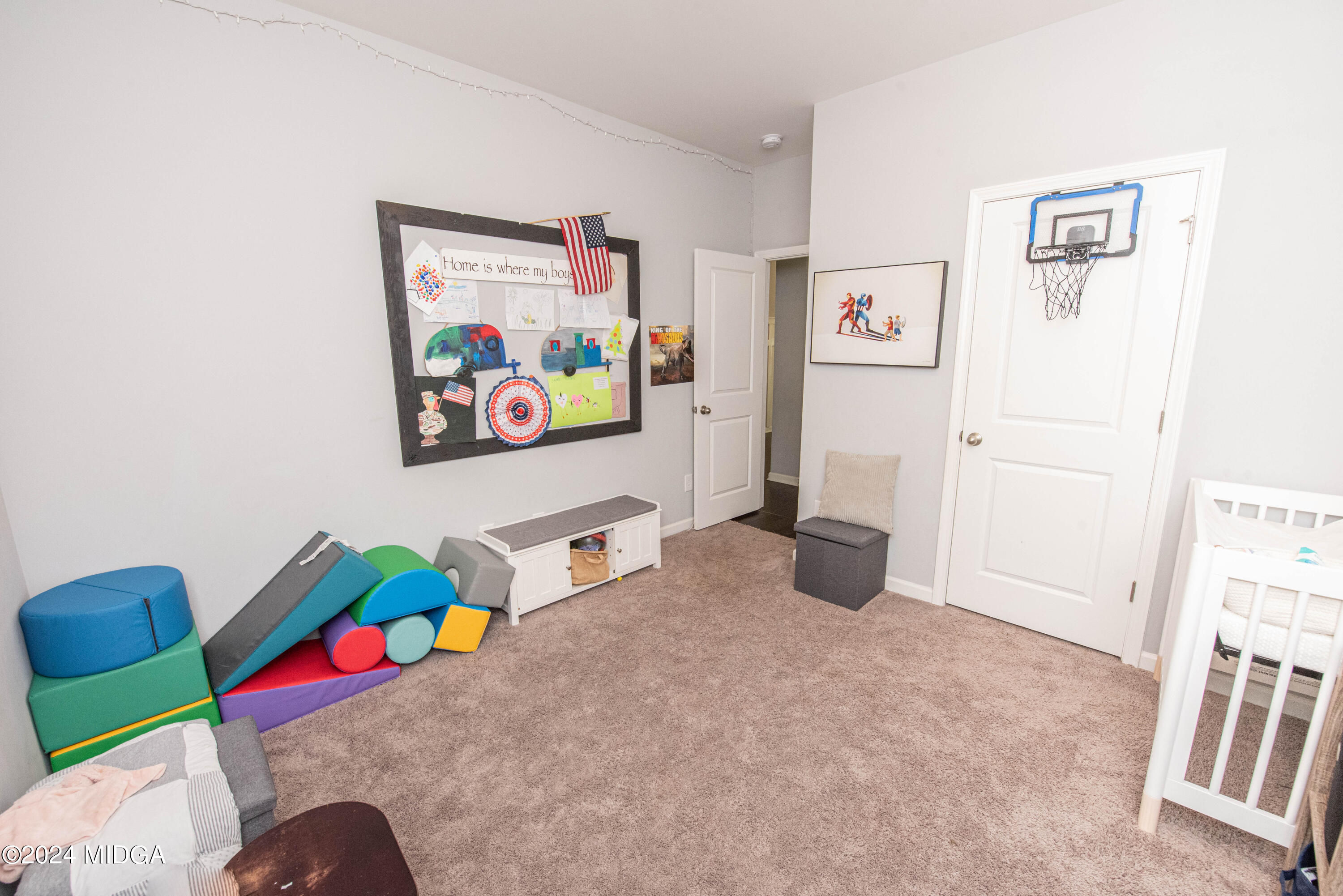 103 Wax Myrtle Way Perry, GA 31069 - Photo 22 of 62 a bedroom with furniture and a bed