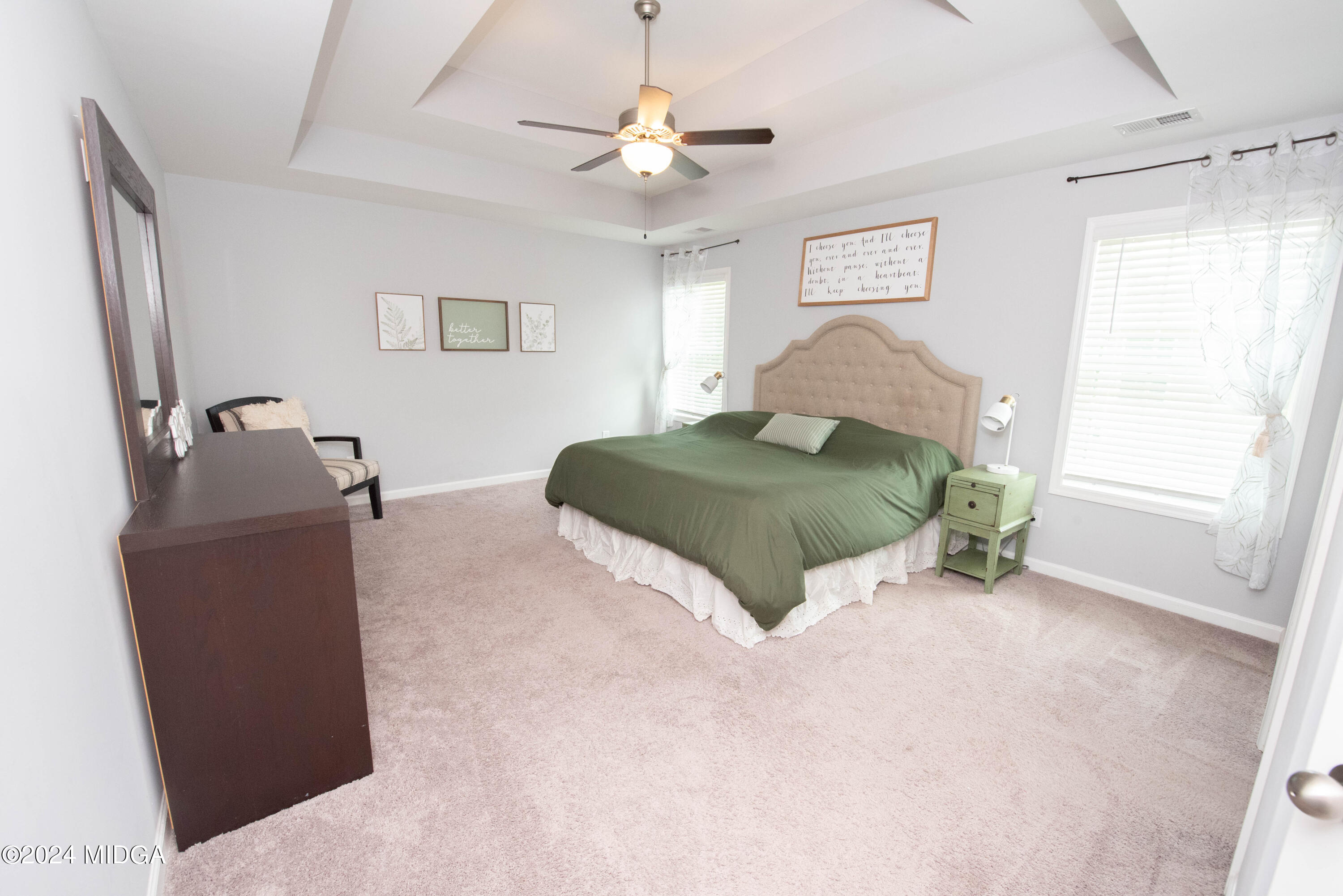103 Wax Myrtle Way Perry, GA 31069 - Photo 34 of 62 a living room with furniture and a chandelier