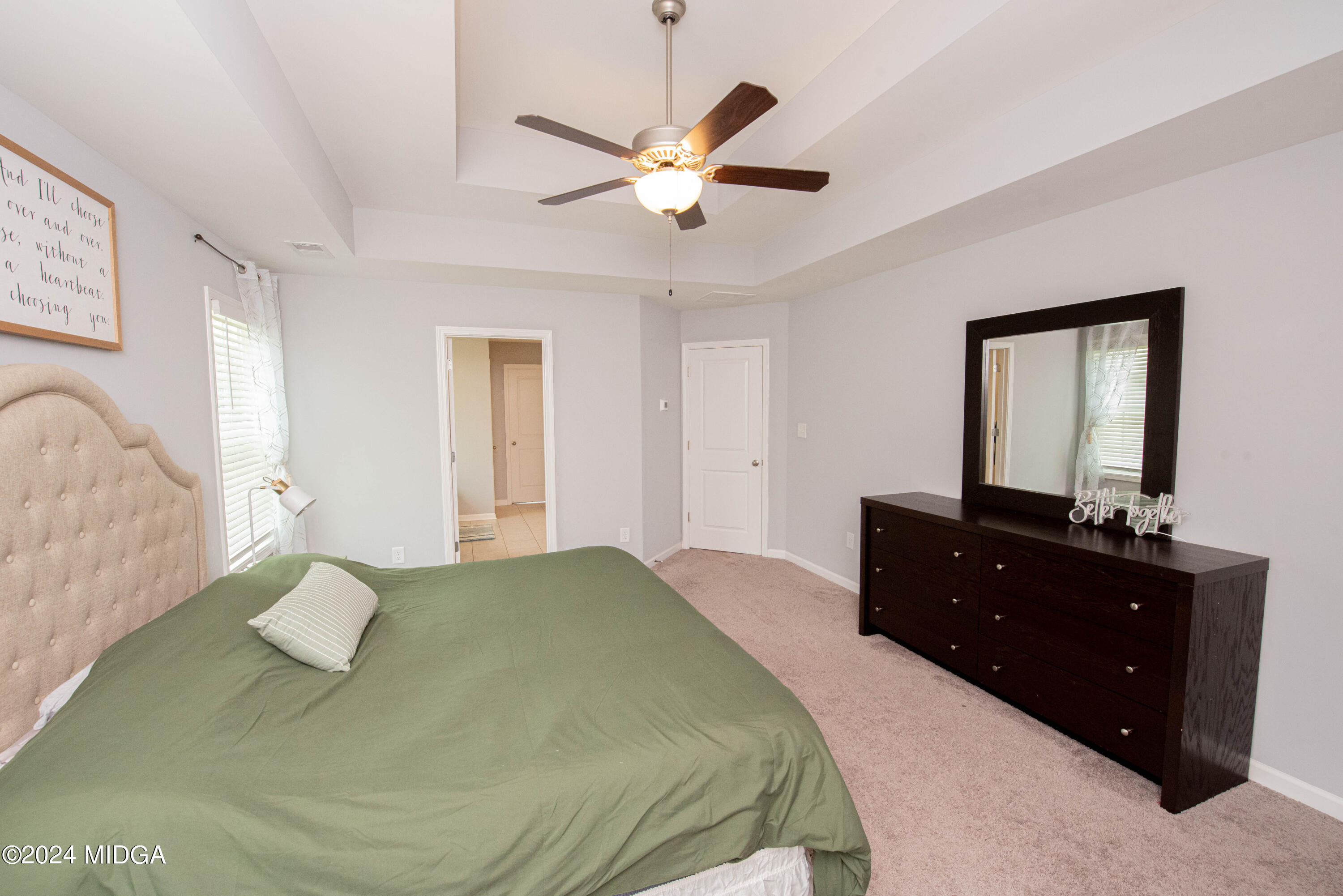 103 Wax Myrtle Way Perry, GA 31069 - Photo 37 of 62 a bedroom with a bed and a dresser