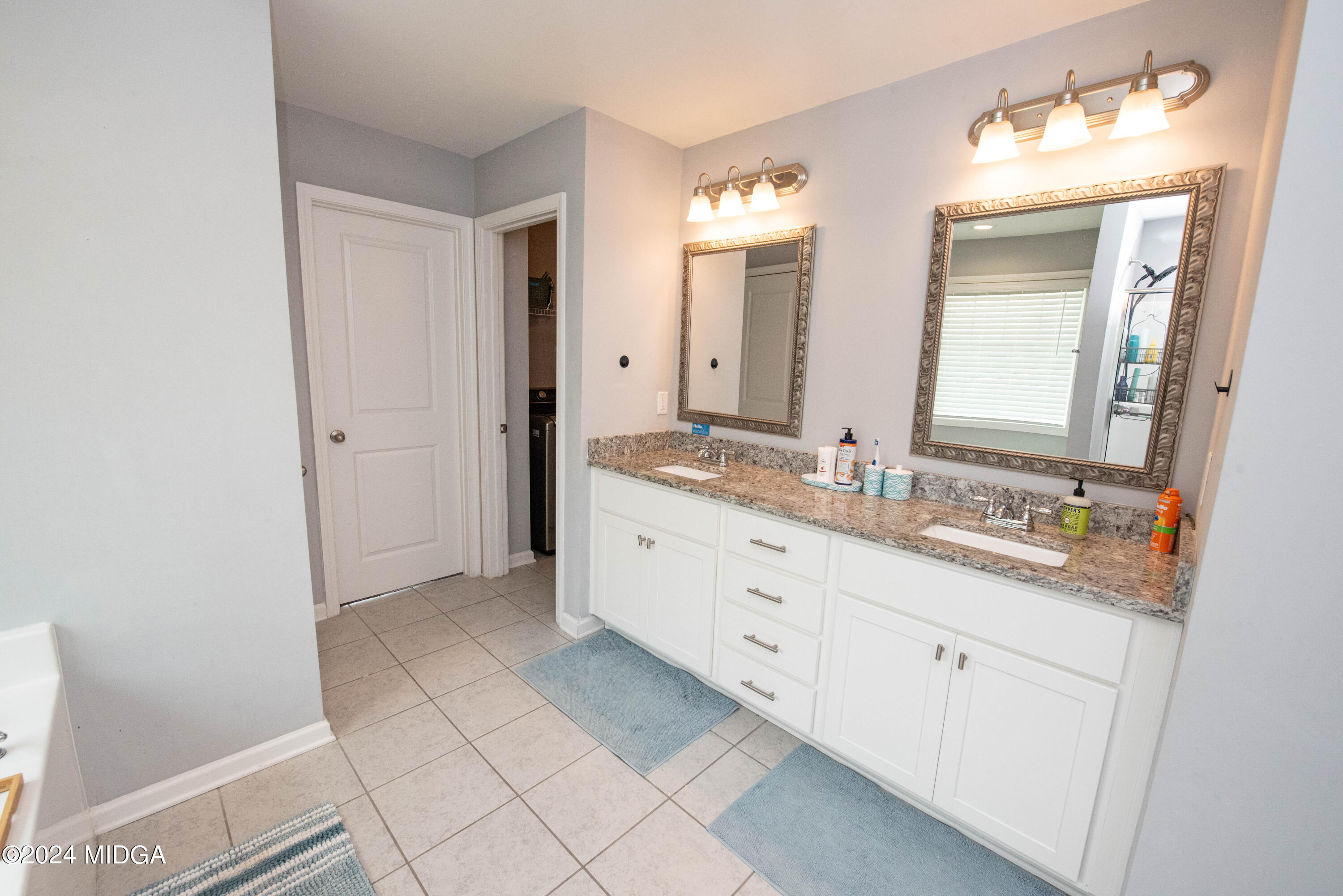 103 Wax Myrtle Way Perry, GA 31069 - Photo 40 of 62 a spacious bathroom with a double vanity sink mirror and
