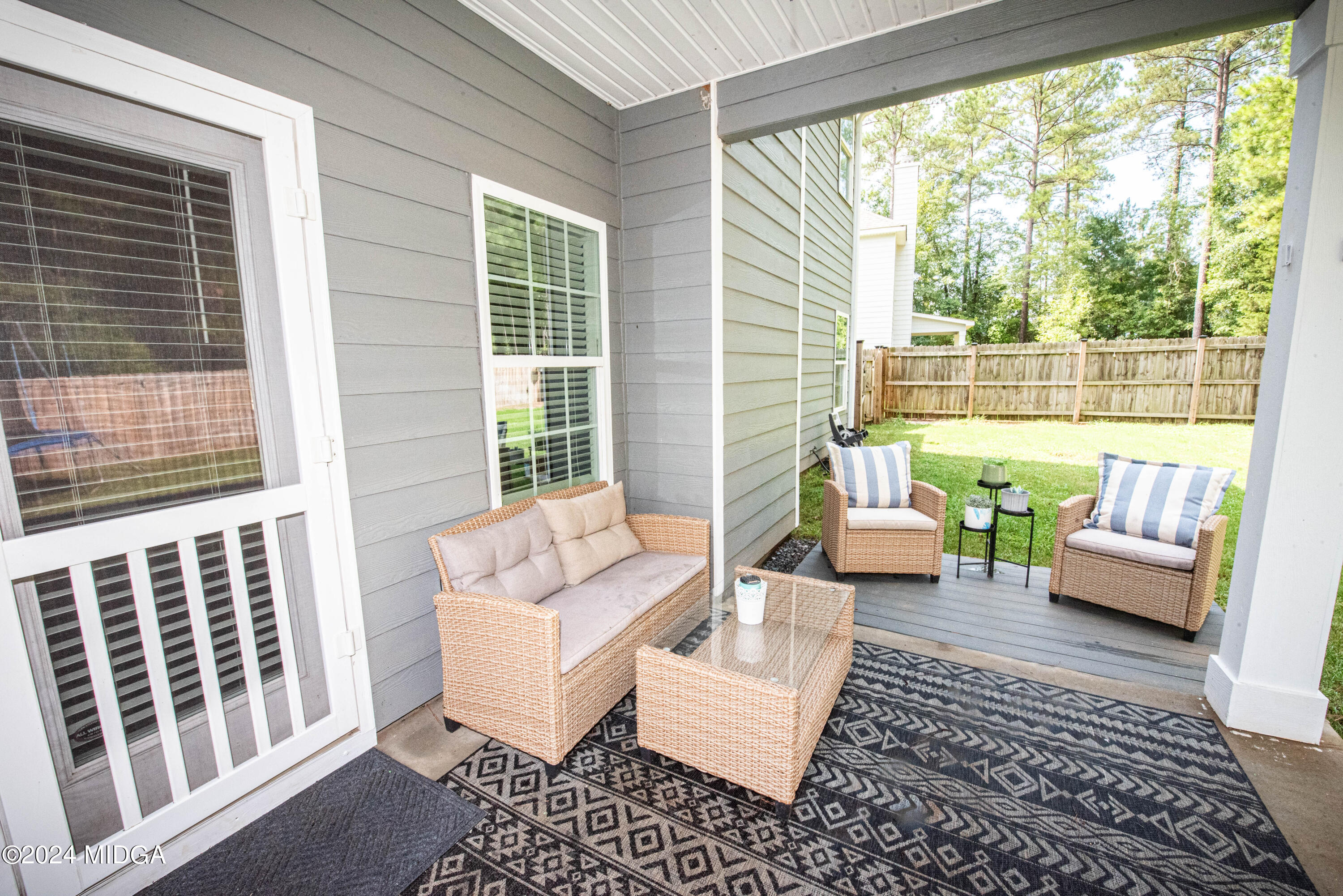 103 Wax Myrtle Way Perry, GA 31069 - Photo 56 of 62 a living room with furniture and a large window