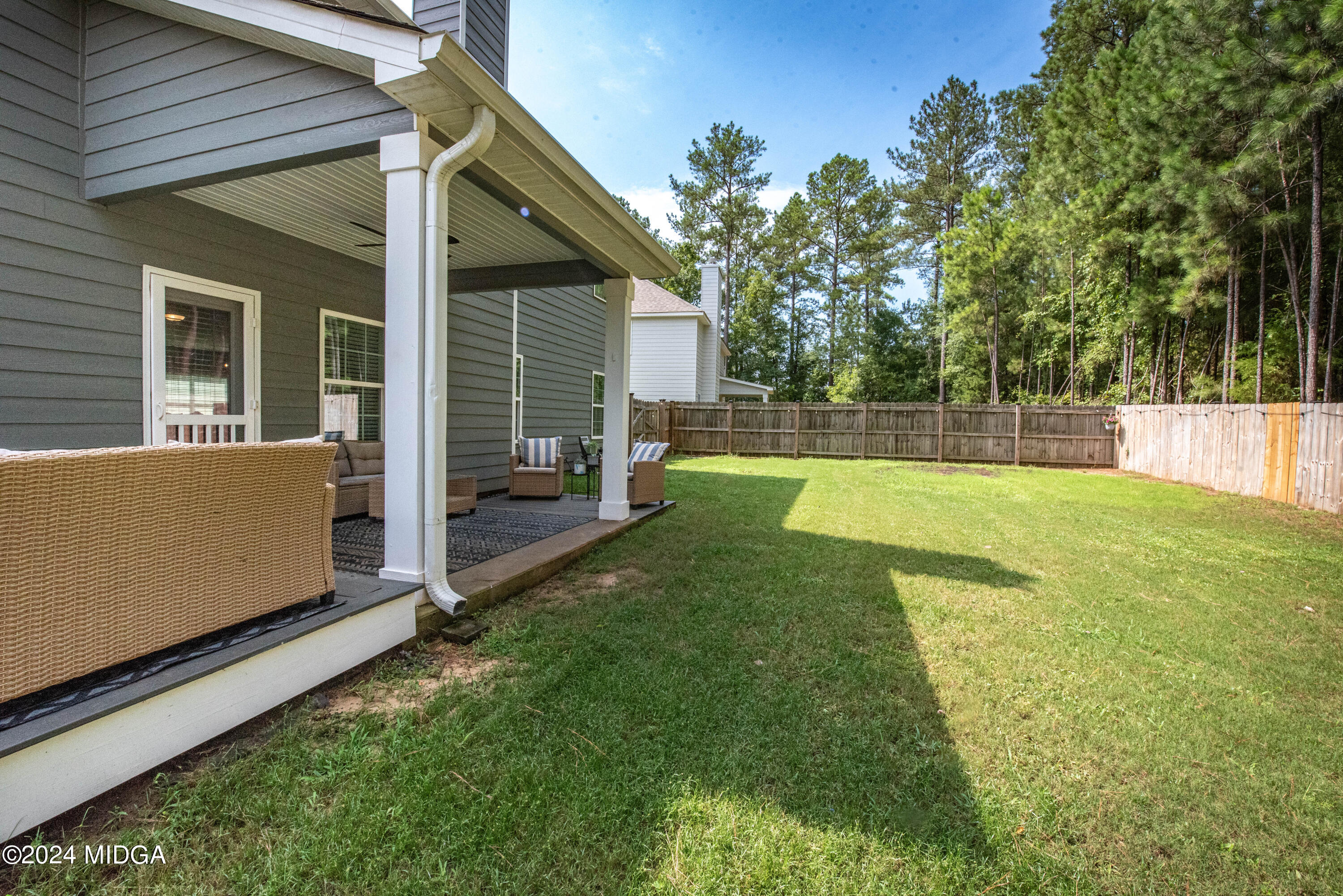 103 Wax Myrtle Way Perry, GA 31069 - Photo 60 of 62 a view of a backyard with a small cabin