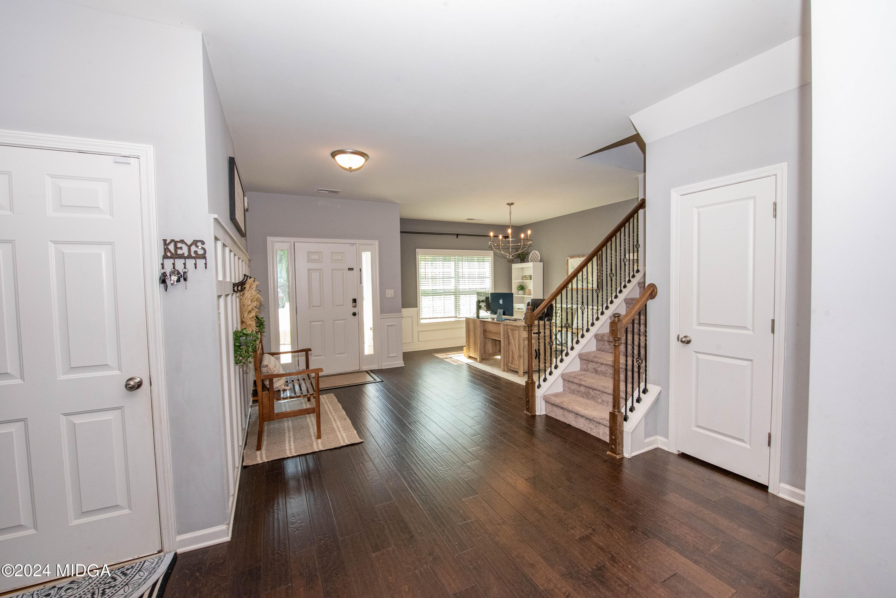 103 Wax Myrtle Way Perry, GA 31069 - Photo 9 of 62 a view of a hallway with wooden floor windows