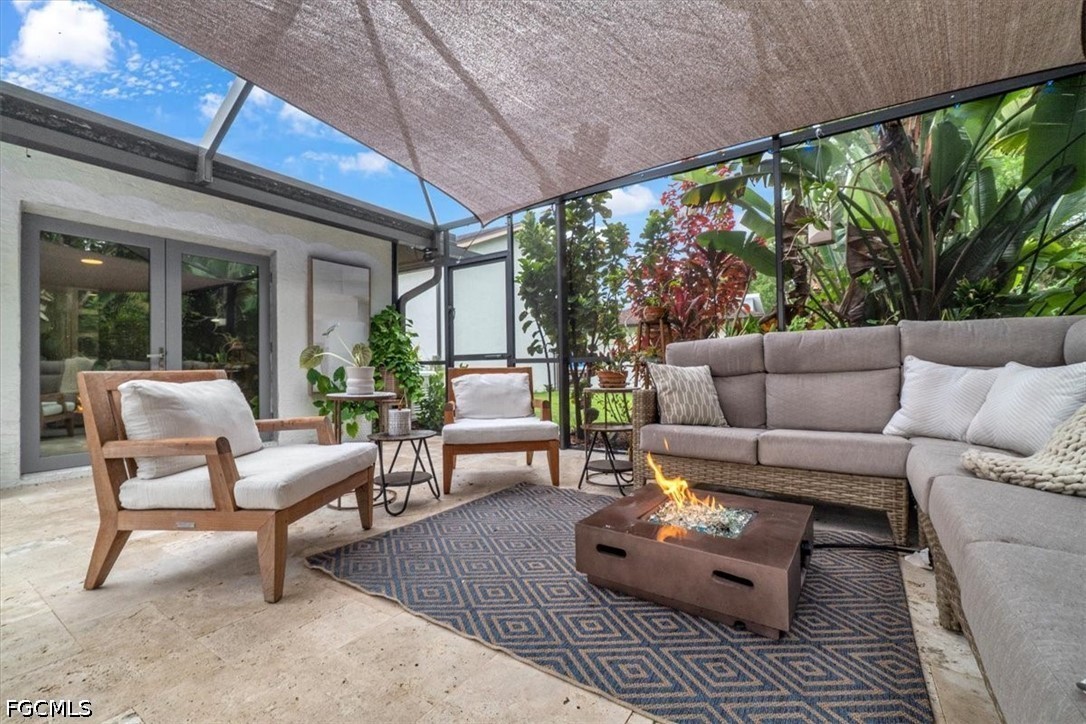 202 Ridgewood Avenue Clewiston, FL 33440 - Photo 24 of 50 a outdoor living space with furniture and garden view